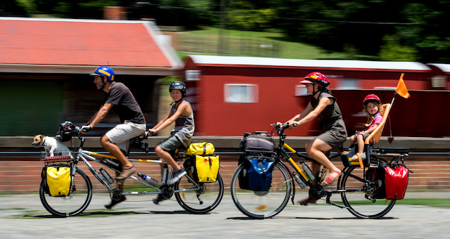 Patrick Jones, Meg Ulman, their two boys, Zephyr Ogden Jones, 12, and Woody Ulman Jones, 2, and their trusty Jack Russell, Zero, are all about permaculture living and travel. They are back at their Daylesford home after cycling their way up the east coast to Cooktown over the past 13 months. Picture: Jay Town